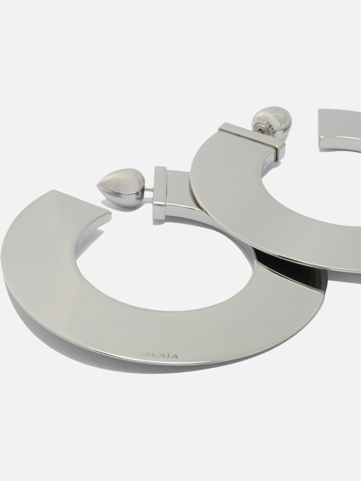 Alaïa "Blade" hoop earrings Silver