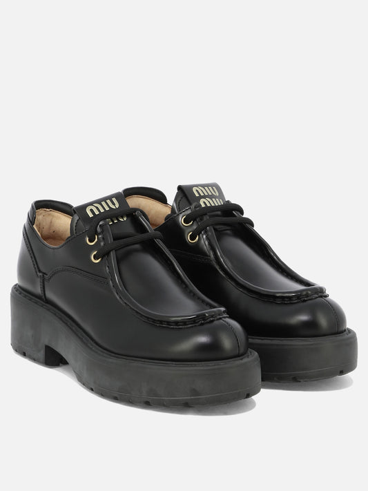 Laced loafers 100% calf leather - 100% calf leather Black - Miu Miu Women | PLP | VIETTI Online Store | 2