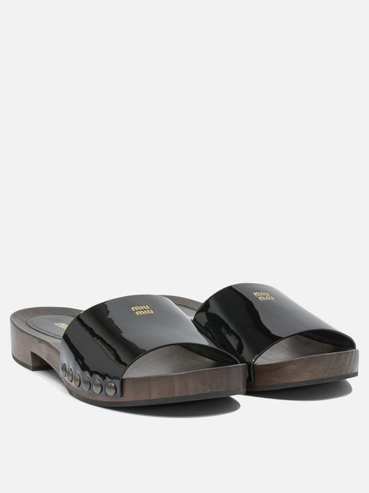 Flat sandals 100% leather - 100% wood Black - Miu Miu Women | PLP | VIETTI Online Store | 2