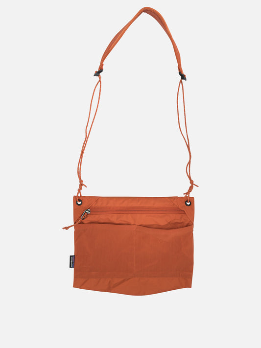Small bags 100% recycled nylon - Lining: 100% recycled polyester  Orange - Patagonia Men | PLP | VIETTI Online Store 
