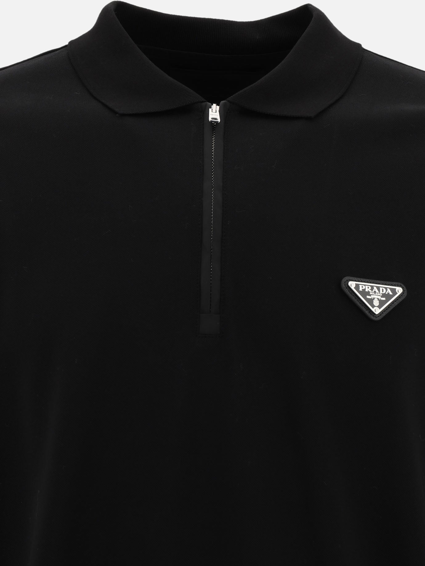 Polo con logo triangolo