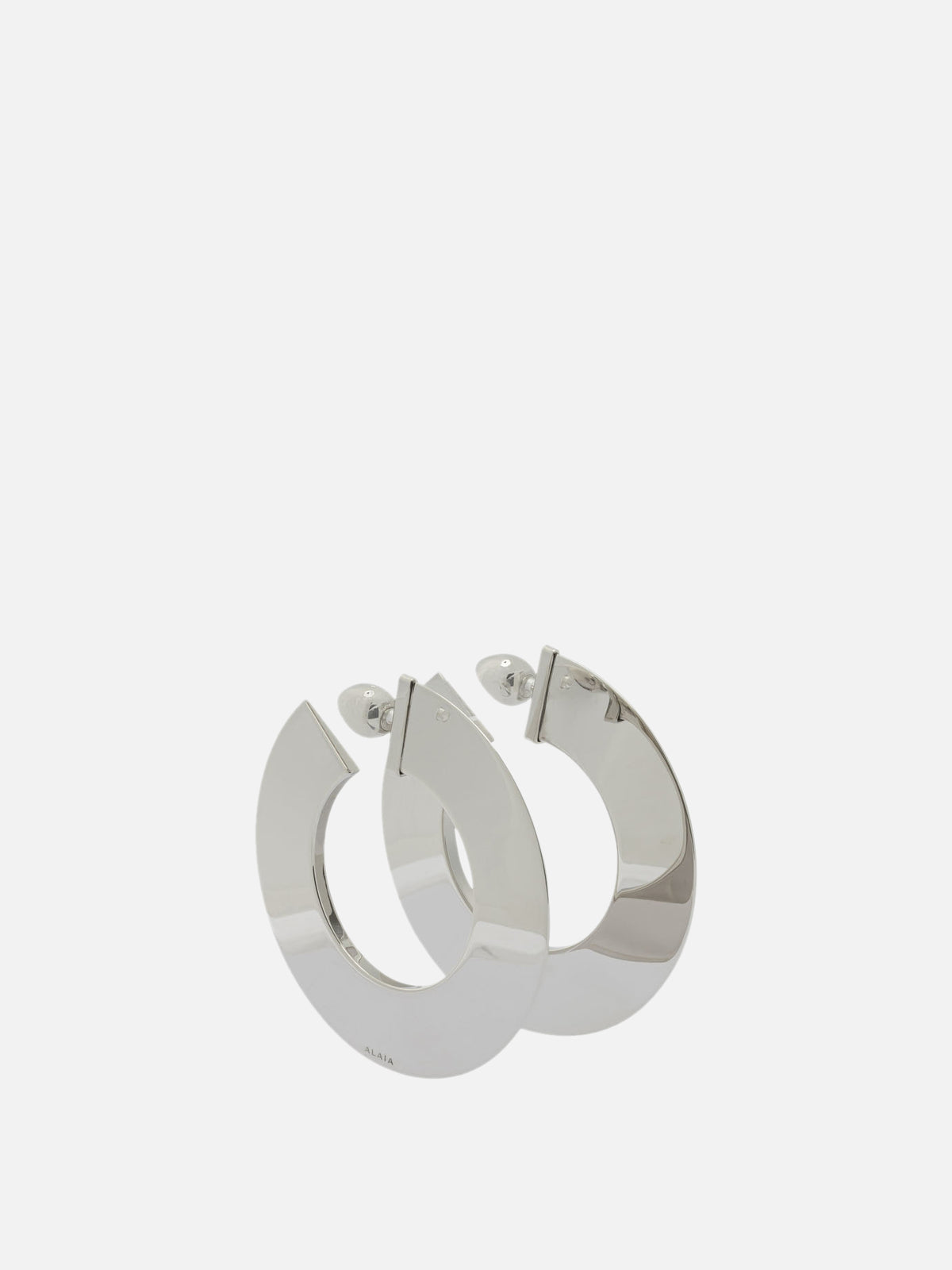 Alaïa "Blade" hoop earrings Silver
